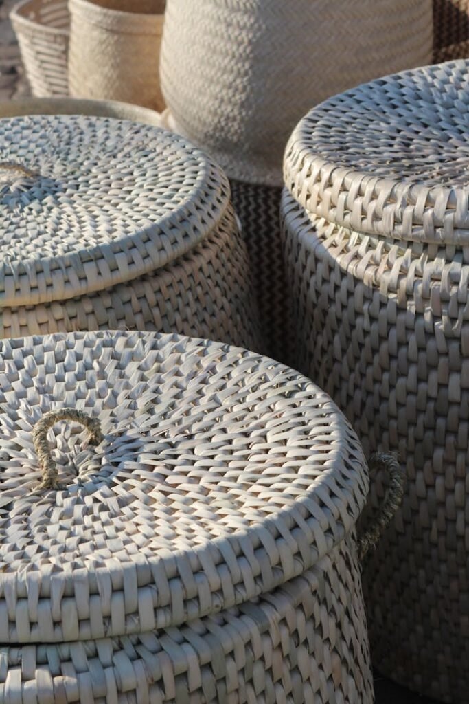 Close-up of artisanal woven baskets showcasing African craft in natural light.